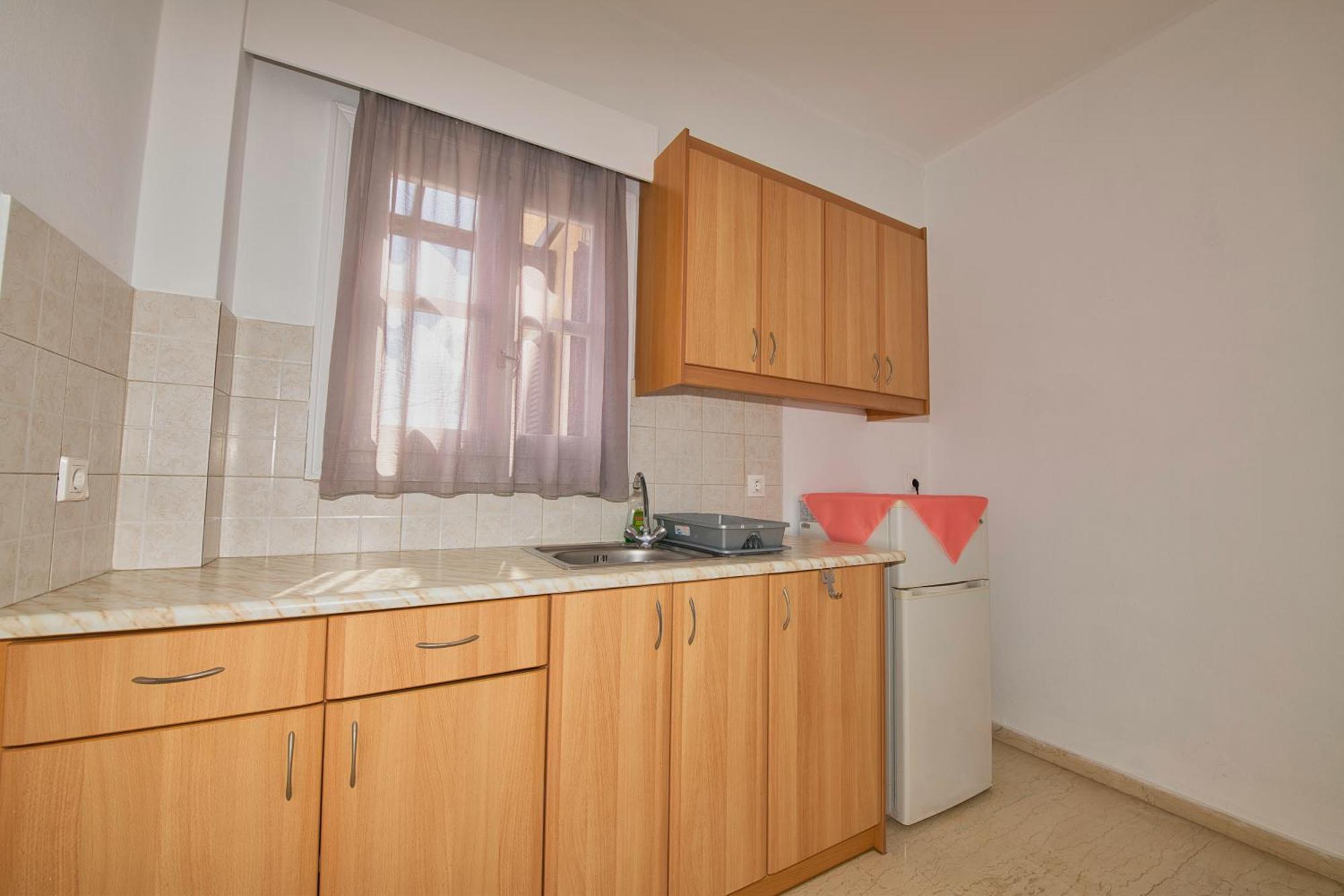 Ira Apartments คามารี ภายนอก รูปภาพ